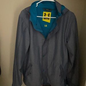 Under Armour hooded jacket, Gray in color with some bluish green on inside